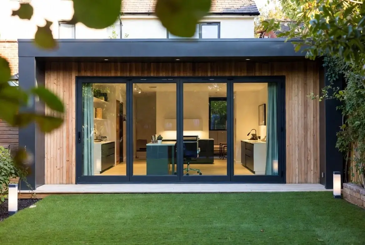 Modern garden office room in Berkshire with glass doors and timber cladding built by AA Contractor