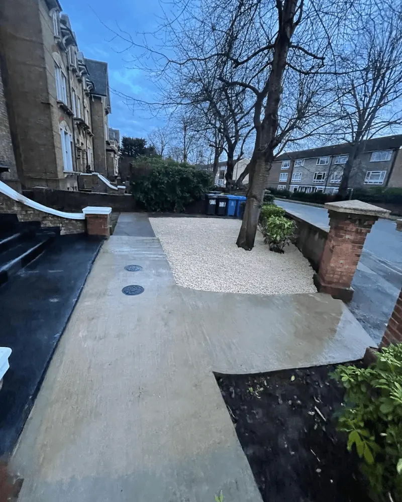 Front driveway and landscaping project with new concrete pathway and gravel area in Berkshire