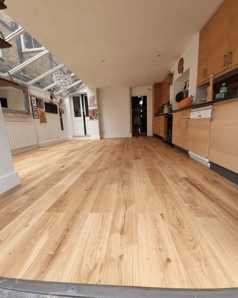 Oak effect flooring installation in kitchen extension completed in Berkshire