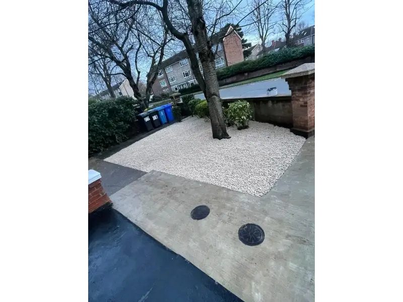Decorative white gravel installed in front garden landscaping project with tree feature in Berkshire